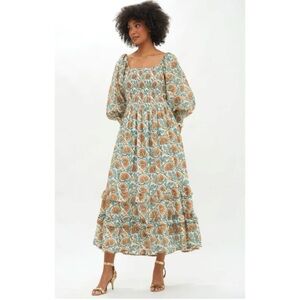 Oliphant Smocked Top Ruffle Midi Dress
Montenegro Amber